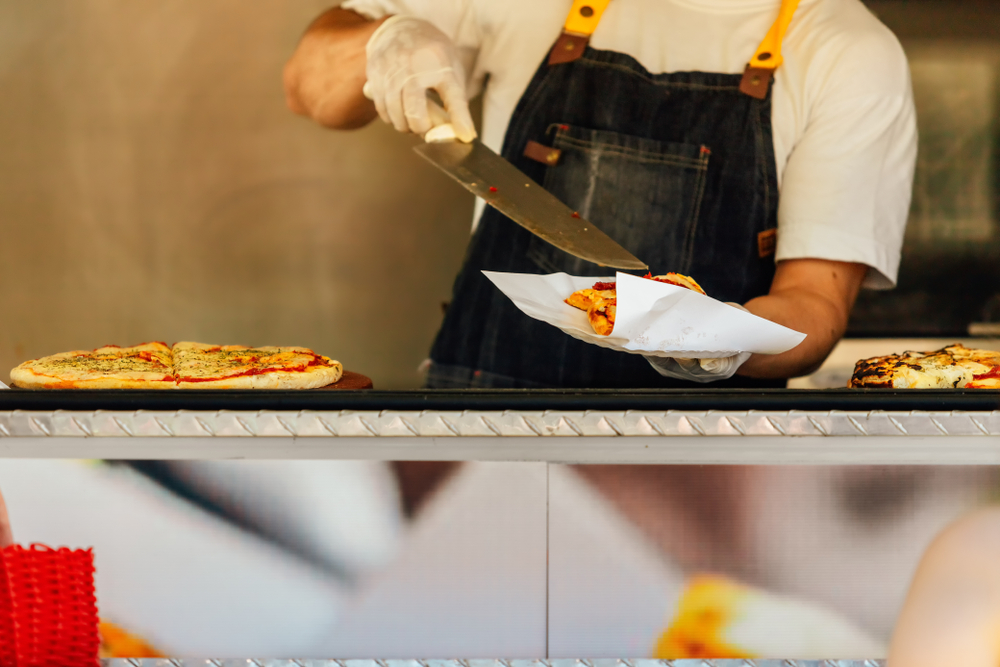 Pizza being served